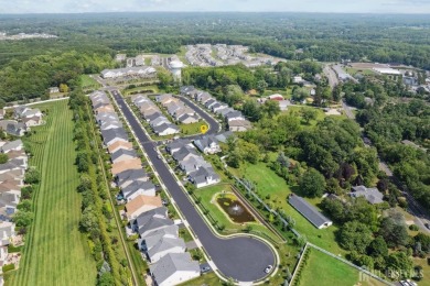 Magnificent ~ Spectacular ~ Outstanding - are just a few words on Regency At Monroe Golf and Country Club in New Jersey - for sale on GolfHomes.com, golf home, golf lot