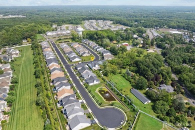 Magnificent ~ Spectacular ~ Outstanding - are just a few words on Regency At Monroe Golf and Country Club in New Jersey - for sale on GolfHomes.com, golf home, golf lot