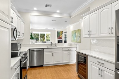 AN INSPIRED RE-DESIGN OF A BEAUTIFULLY UPDATED GOLF COTTAGE at on Oak Harbor Country Club in Florida - for sale on GolfHomes.com, golf home, golf lot