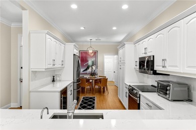 AN INSPIRED RE-DESIGN OF A BEAUTIFULLY UPDATED GOLF COTTAGE at on Oak Harbor Country Club in Florida - for sale on GolfHomes.com, golf home, golf lot