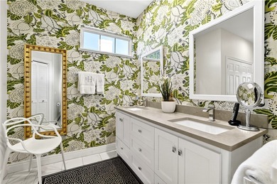 AN INSPIRED RE-DESIGN OF A BEAUTIFULLY UPDATED GOLF COTTAGE at on Oak Harbor Country Club in Florida - for sale on GolfHomes.com, golf home, golf lot