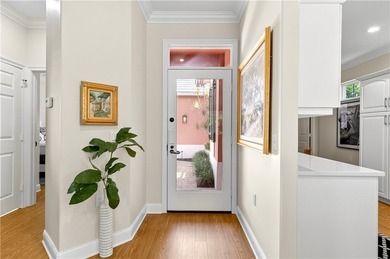 AN INSPIRED RE-DESIGN OF A BEAUTIFULLY UPDATED GOLF COTTAGE at on Oak Harbor Country Club in Florida - for sale on GolfHomes.com, golf home, golf lot