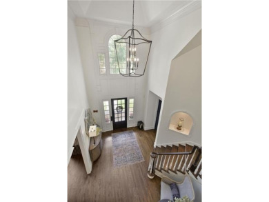 Exquisite and beautifully updated home nestled in the exclusive on The Golf Club of Georgia in Georgia - for sale on GolfHomes.com, golf home, golf lot