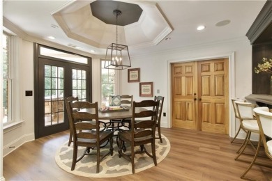 Exquisite and beautifully updated home nestled in the exclusive on The Golf Club of Georgia in Georgia - for sale on GolfHomes.com, golf home, golf lot