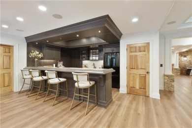Exquisite and beautifully updated home nestled in the exclusive on The Golf Club of Georgia in Georgia - for sale on GolfHomes.com, golf home, golf lot