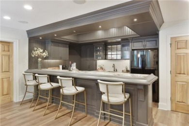 Exquisite and beautifully updated home nestled in the exclusive on The Golf Club of Georgia in Georgia - for sale on GolfHomes.com, golf home, golf lot