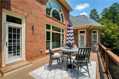 Exquisite and beautifully updated home nestled in the exclusive on The Golf Club of Georgia in Georgia - for sale on GolfHomes.com, golf home, golf lot