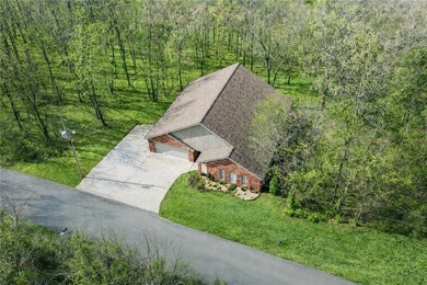 Privacy, peaceful woods, and a well-maintained home ready for on Bella Vista Country Club and Golf Course in Arkansas - for sale on GolfHomes.com, golf home, golf lot