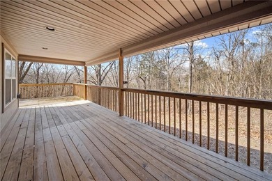 Privacy, peaceful woods, and a well-maintained home ready for on Bella Vista Country Club and Golf Course in Arkansas - for sale on GolfHomes.com, golf home, golf lot