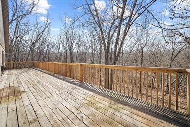 Privacy, peaceful woods, and a well-maintained home ready for on Bella Vista Country Club and Golf Course in Arkansas - for sale on GolfHomes.com, golf home, golf lot