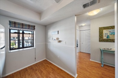 Discover this beautifully updated furnished 2-bedroom on Capri Isle Golf Club in Florida - for sale on GolfHomes.com, golf home, golf lot