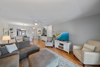 Discover this beautifully updated furnished 2-bedroom on Capri Isle Golf Club in Florida - for sale on GolfHomes.com, golf home, golf lot