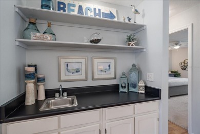 Discover this beautifully updated furnished 2-bedroom on Capri Isle Golf Club in Florida - for sale on GolfHomes.com, golf home, golf lot