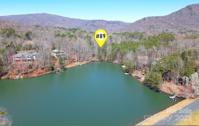 Discover a rare opportunity to craft your luxury lake retreat in on Rumbling Bald Resort on Lake Lure in North Carolina - for sale on GolfHomes.com, golf home, golf lot
