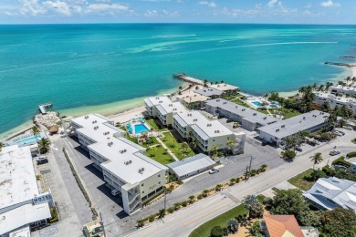White sand oceanfront condo with breathtaking blue Ocean views on Key Colony Beach Golf Course in Florida - for sale on GolfHomes.com, golf home, golf lot
