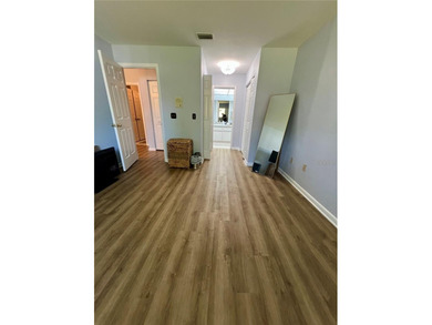 Welcome to 6 Willow Grove Place, a beautiful home nestled in a on The Grand Club - Pine Lakes Course in Florida - for sale on GolfHomes.com, golf home, golf lot