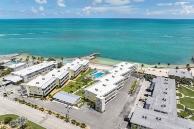 White sand oceanfront condo with breathtaking blue Ocean views on Key Colony Beach Golf Course in Florida - for sale on GolfHomes.com, golf home, golf lot