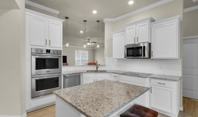 This three-bedroom residence, situated in the heart of the on Twin Rivers Golf Club in Texas - for sale on GolfHomes.com, golf home, golf lot