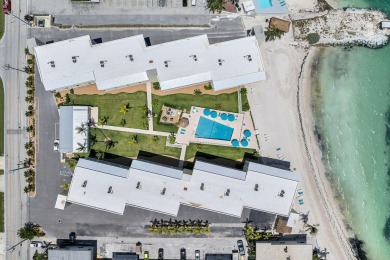 White sand oceanfront condo with breathtaking blue Ocean views on Key Colony Beach Golf Course in Florida - for sale on GolfHomes.com, golf home, golf lot