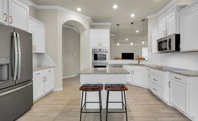 This three-bedroom residence, situated in the heart of the on Twin Rivers Golf Club in Texas - for sale on GolfHomes.com, golf home, golf lot