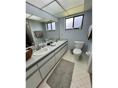 Welcome to 6 Willow Grove Place, a beautiful home nestled in a on The Grand Club - Pine Lakes Course in Florida - for sale on GolfHomes.com, golf home, golf lot