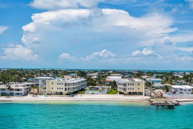 White sand oceanfront condo with breathtaking blue Ocean views on Key Colony Beach Golf Course in Florida - for sale on GolfHomes.com, golf home, golf lot