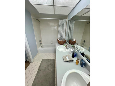 Welcome to 6 Willow Grove Place, a beautiful home nestled in a on The Grand Club - Pine Lakes Course in Florida - for sale on GolfHomes.com, golf home, golf lot