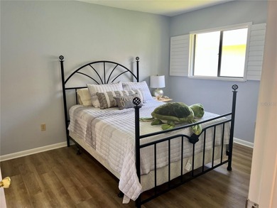 Welcome to 6 Willow Grove Place, a beautiful home nestled in a on The Grand Club - Pine Lakes Course in Florida - for sale on GolfHomes.com, golf home, golf lot