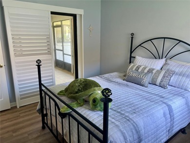 Welcome to 6 Willow Grove Place, a beautiful home nestled in a on The Grand Club - Pine Lakes Course in Florida - for sale on GolfHomes.com, golf home, golf lot