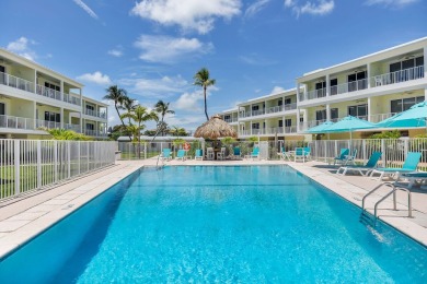 White sand oceanfront condo with breathtaking blue Ocean views on Key Colony Beach Golf Course in Florida - for sale on GolfHomes.com, golf home, golf lot