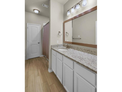 This three-bedroom residence, situated in the heart of the on Twin Rivers Golf Club in Texas - for sale on GolfHomes.com, golf home, golf lot