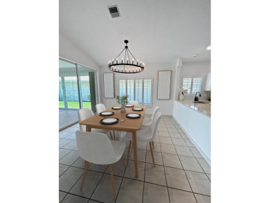This beautifully renovated single family home features an open on Capri Isle Golf Club in Florida - for sale on GolfHomes.com, golf home, golf lot