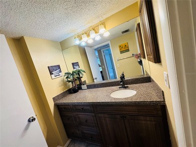 Discover the best of Florida living in this beautifully updated on IMG Academies Golf and Country Club in Florida - for sale on GolfHomes.com, golf home, golf lot