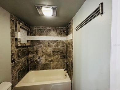 Discover the best of Florida living in this beautifully updated on IMG Academies Golf and Country Club in Florida - for sale on GolfHomes.com, golf home, golf lot