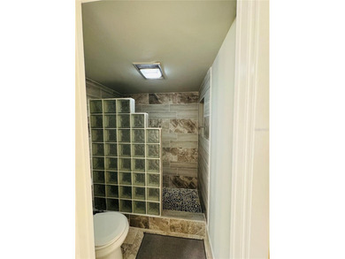 Discover the best of Florida living in this beautifully updated on IMG Academies Golf and Country Club in Florida - for sale on GolfHomes.com, golf home, golf lot