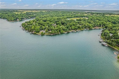 Lake front and second tier lots in the sought-after Sugar Valley on Sugar Valley Lakes Golf Course in Kansas - for sale on GolfHomes.com, golf home, golf lot