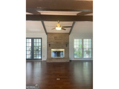 This ranch home is happily situated on a beautiful 1.03-acre lot on Honey Creek Country Club in Georgia - for sale on GolfHomes.com, golf home, golf lot
