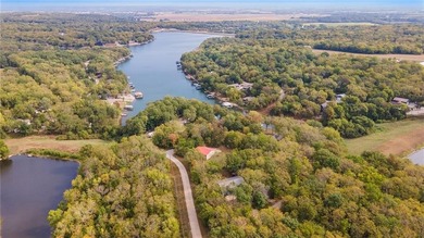 Lake front and second tier lots in the sought-after Sugar Valley on Sugar Valley Lakes Golf Course in Kansas - for sale on GolfHomes.com, golf home, golf lot