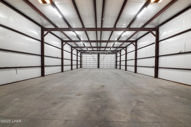 Discover a one-of-a-kind lifestyle at Riverbound Custom Storage on The Refuge Golf and Country Club in Arizona - for sale on GolfHomes.com, golf home, golf lot