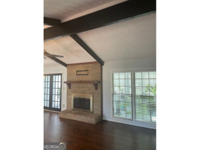 This ranch home is happily situated on a beautiful 1.03-acre lot on Honey Creek Country Club in Georgia - for sale on GolfHomes.com, golf home, golf lot