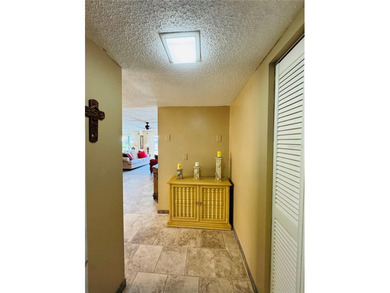 Discover the best of Florida living in this beautifully updated on IMG Academies Golf and Country Club in Florida - for sale on GolfHomes.com, golf home, golf lot