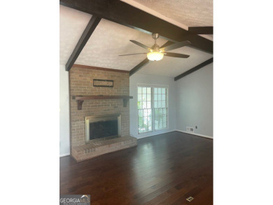 This ranch home is happily situated on a beautiful 1.03-acre lot on Honey Creek Country Club in Georgia - for sale on GolfHomes.com, golf home, golf lot