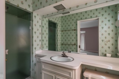 Discover the ease of single-level living with stunning vistas of on Country Club of Detroit - Regulation in Michigan - for sale on GolfHomes.com, golf home, golf lot