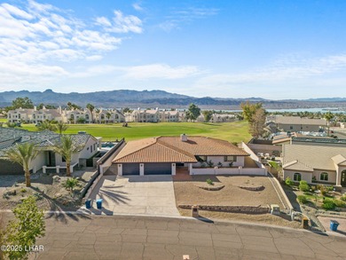 Welcome to this inviting single-family home situated along the on London Bridge Golf Course in Arizona - for sale on GolfHomes.com, golf home, golf lot