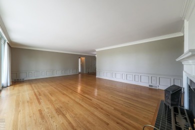 Discover the ease of single-level living with stunning vistas of on Country Club of Detroit - Regulation in Michigan - for sale on GolfHomes.com, golf home, golf lot