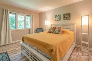 Enjoy privacy and quiet in this conveniently located stand-alone on Country Club of Asheville in North Carolina - for sale on GolfHomes.com, golf home, golf lot