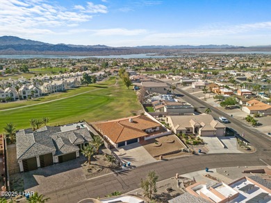 Welcome to this inviting single-family home situated along the on London Bridge Golf Course in Arizona - for sale on GolfHomes.com, golf home, golf lot