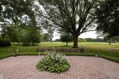 Discover the ease of single-level living with stunning vistas of on Country Club of Detroit - Regulation in Michigan - for sale on GolfHomes.com, golf home, golf lot