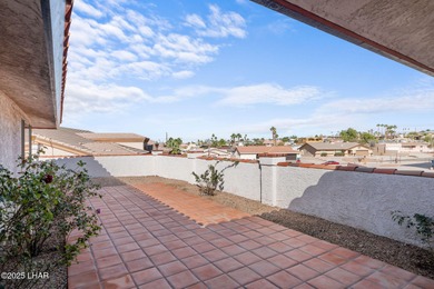 Welcome to this inviting single-family home situated along the on London Bridge Golf Course in Arizona - for sale on GolfHomes.com, golf home, golf lot