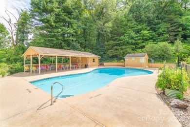 Enjoy privacy and quiet in this conveniently located stand-alone on Country Club of Asheville in North Carolina - for sale on GolfHomes.com, golf home, golf lot